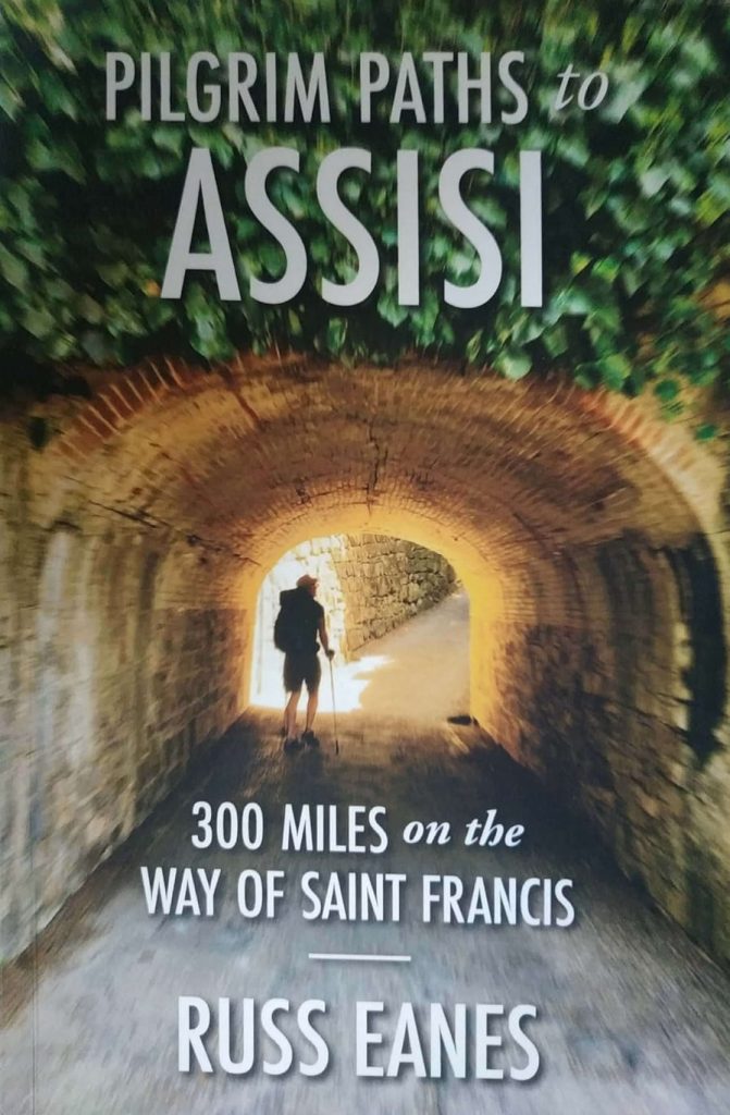 a book cover of a man walking in a tunnel b&b vicino a me Pontassieve Firenze Pilgrim patha to assisi